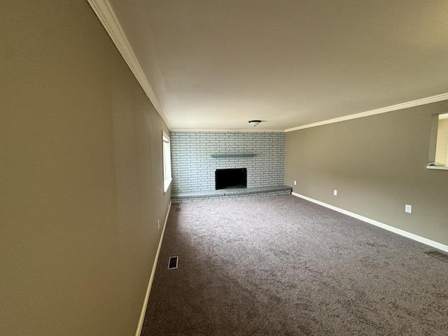 8066 Talladay Rd, Whittaker, MI 48190 - unfurnished living room with carpet, visible vents, crown molding, and baseboards