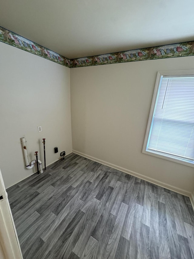8066 Talladay Rd, Whittaker, MI 48190 - spare room featuring wood finished floors