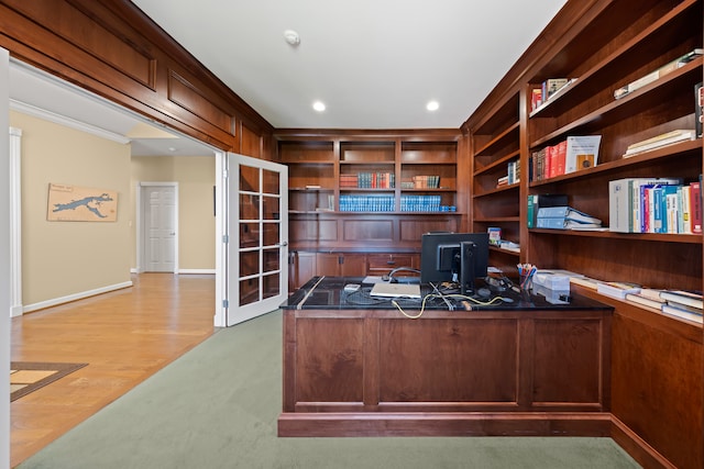 office with built in desk, recessed lighting, baseboards, ornamental molding, and wood finished floors