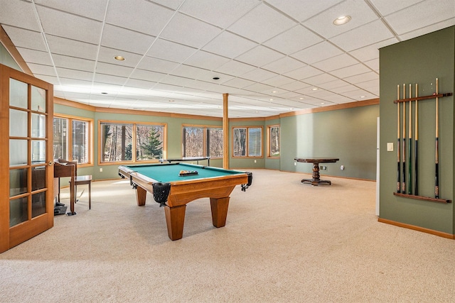 recreation room with a paneled ceiling, carpet floors, pool table, and baseboards