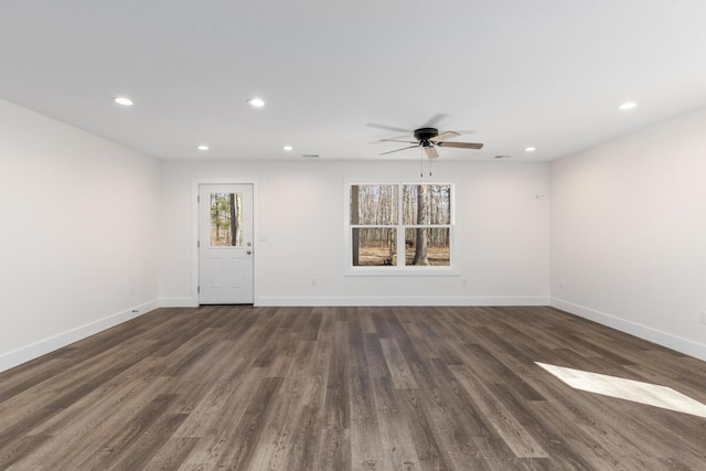 8995 Chippewa Trl, Howard City, MI 49329 - spare room featuring baseboards, a ceiling fan, wood finished floors, and recessed lighting