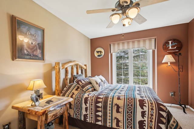 carpeted bedroom with a ceiling fan