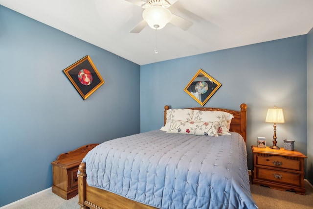 bedroom featuring baseboards, carpet, and ceiling fan