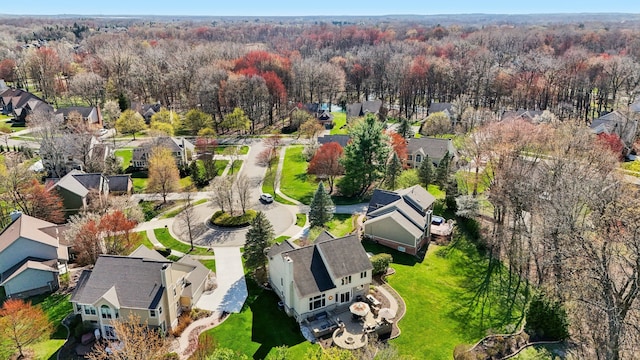 1391 Woodbridge Ct, Wixom, MI 48393 - aerial view with a residential view and a view of trees