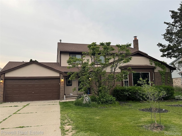 30362 Southampton Ln, Farmington Hills, MI 48331 - view of front of home with brick siding, a front yard, driveway, and a garage