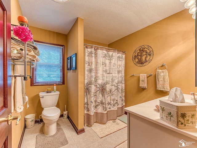 bathroom with tile patterned flooring, a textured ceiling, toilet, and curtained shower