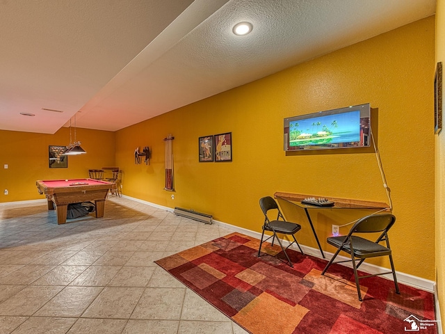 recreation room featuring baseboards, pool table, and a textured ceiling