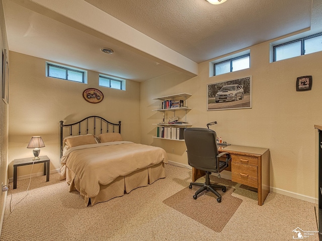 bedroom with carpet and baseboards