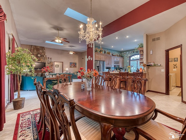 dining space featuring visible vents, recessed lighting, ceiling fan with notable chandelier, light tile patterned floors, and washer / dryer