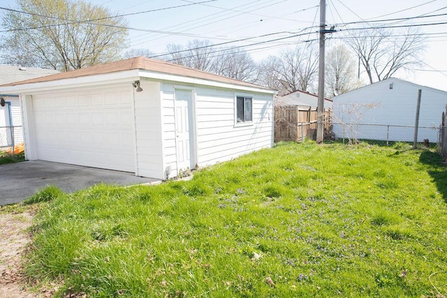 detached garage with fence