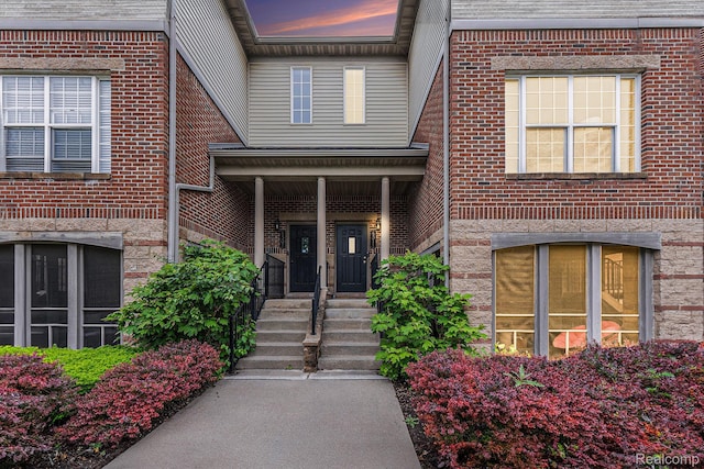 4311 Miracles Blvd Unit 22, Detroit, MI 48201 - view of exterior entry featuring brick siding