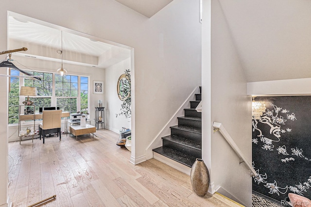 4311 Miracles Blvd Unit 22, Detroit, MI 48201 - stairs with wood finished floors, lofted ceiling, and baseboards
