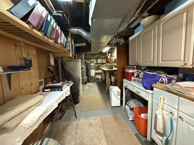 storage room featuring water heater