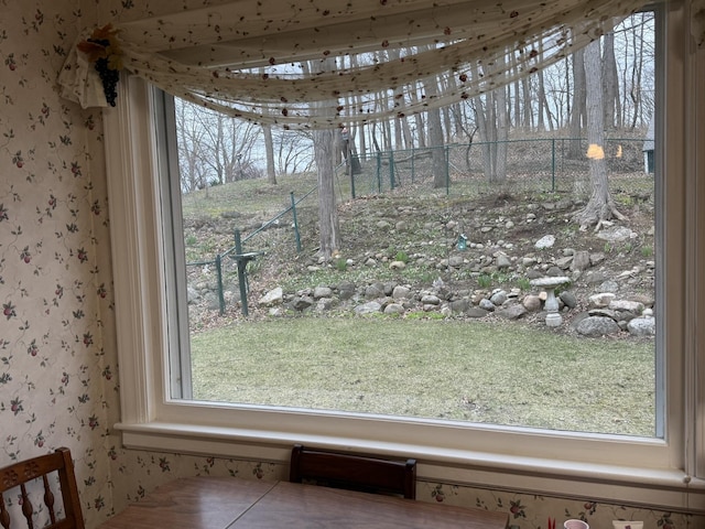 interior details featuring wallpapered walls