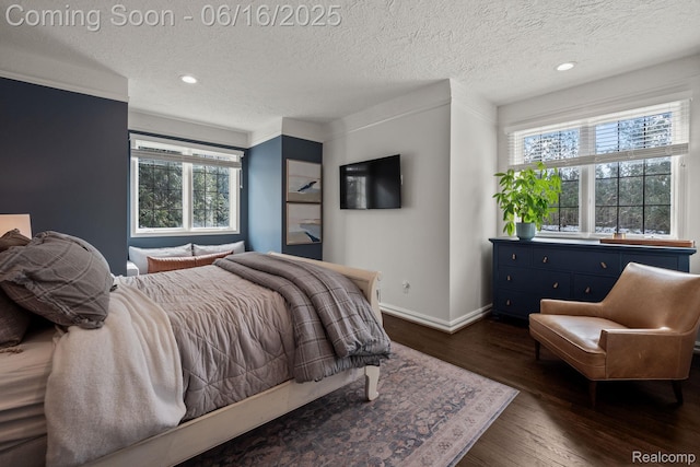 2010 W Valley Rd, Bloomfield Hills, MI 48304 - bedroom featuring dark wood finished floors, a textured ceiling, and recessed lighting