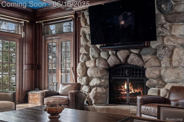 2010 W Valley Rd, Bloomfield Hills, MI 48304 - sitting room with a stone fireplace and wood finished floors