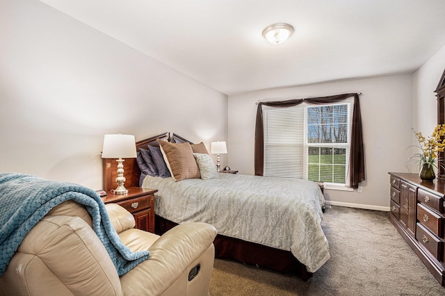 bedroom with carpet and baseboards