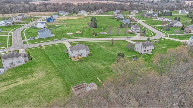 birds eye view of property with a residential view
