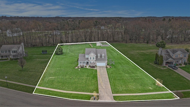 aerial view featuring a forest view