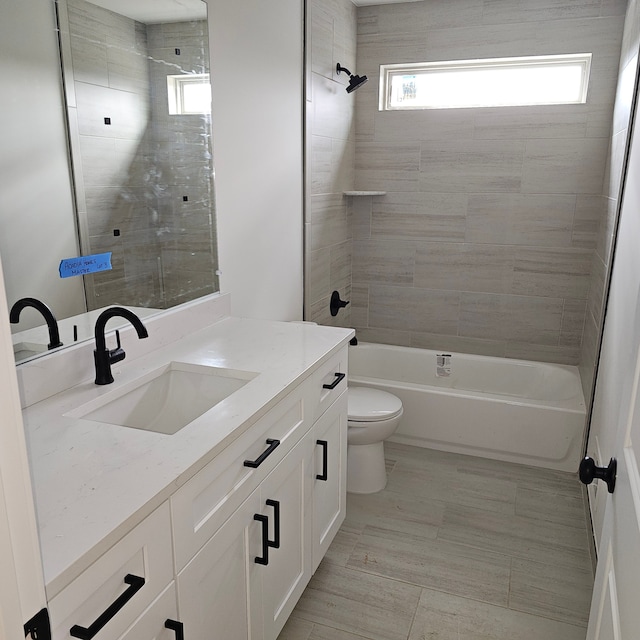 50638 Mistwood Dr, Macomb, MI 48042 - bathroom featuring vanity, toilet, and shower / tub combination