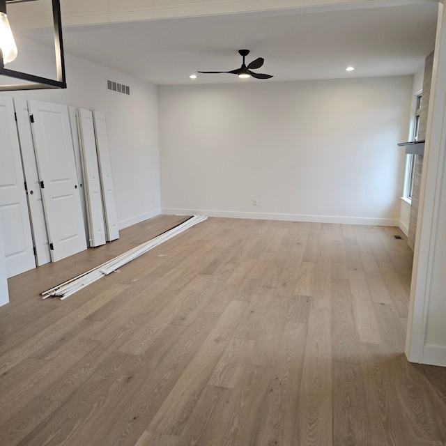 50638 Mistwood Dr, Macomb, MI 48042 - empty room featuring ceiling fan, light wood finished floors, baseboards, and recessed lighting