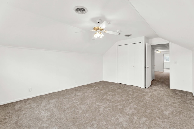 bonus room with carpet flooring, ceiling fan, vaulted ceiling, and visible vents