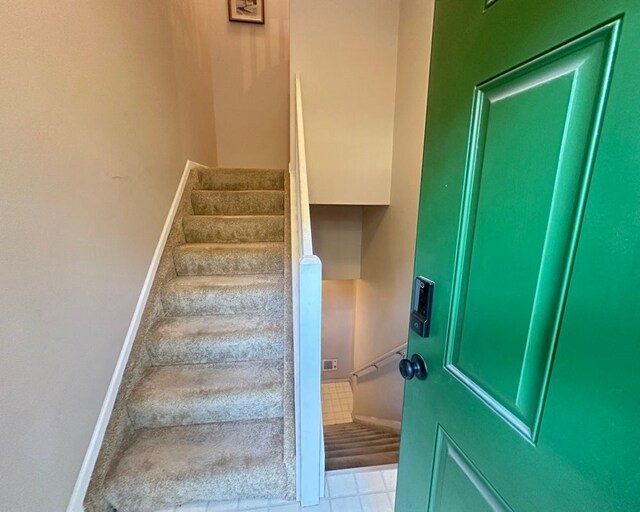 staircase with baseboards