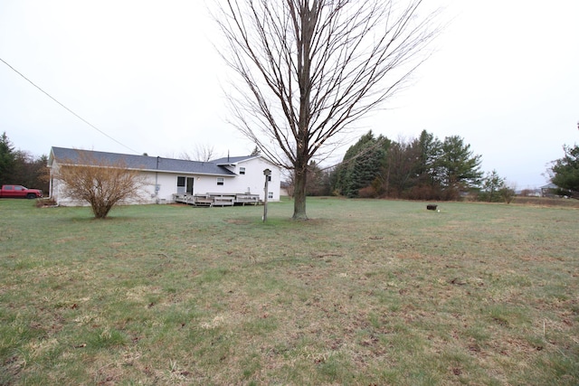 1154 Martin Dr, Frankfort, MI 49635 - view of yard with a wooden deck