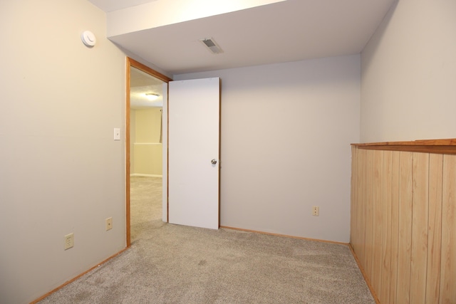 1154 Martin Dr, Frankfort, MI 49635 - spare room with visible vents and light colored carpet