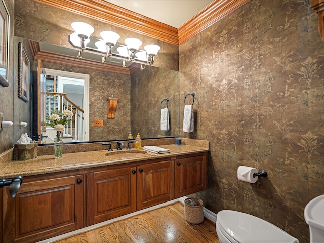 14165 Bournemuth Dr, Shelby Twp, MI 48315 - half bathroom with wood finished floors, vanity, ornamental molding, and toilet