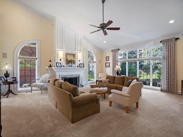 14165 Bournemuth Dr, Shelby Twp, MI 48315 - living area with recessed lighting, light colored carpet, a premium fireplace, a ceiling fan, and ornamental molding