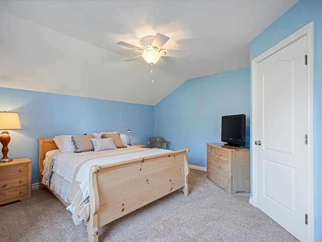 14165 Bournemuth Dr, Shelby Twp, MI 48315 - carpeted bedroom featuring lofted ceiling, a ceiling fan, and baseboards