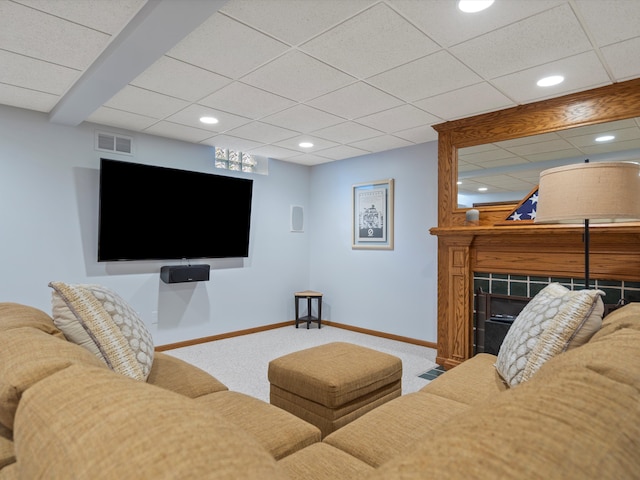 14165 Bournemuth Dr, Shelby Twp, MI 48315 - carpeted living room featuring a paneled ceiling, baseboards, visible vents, recessed lighting, and a fireplace