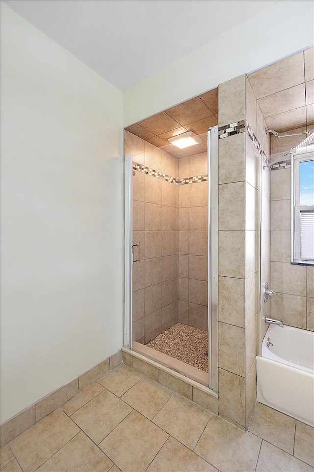 full bathroom with tile patterned flooring