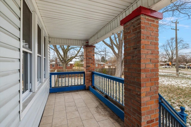 balcony featuring a porch