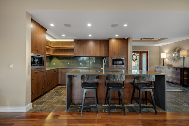 kitchen featuring open shelves, oven, a sink, and recessed lighting