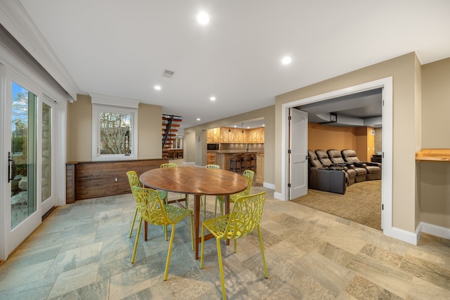 dining room with recessed lighting, stone finish floor, visible vents, and baseboards