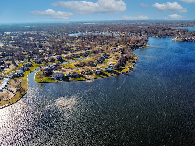 bird's eye view with a water view and a residential view