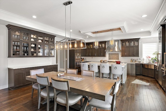3888 Thatcher Dr, Rochester Hills, MI 48309 - dining room with ornamental molding, dark wood-style floors, recessed lighting, and a raised ceiling