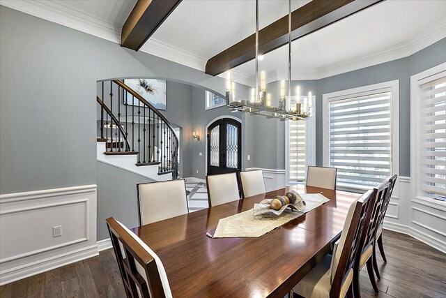 3888 Thatcher Dr, Rochester Hills, MI 48309 - dining area featuring an inviting chandelier, wood finished floors, arched walkways, beam ceiling, and stairs