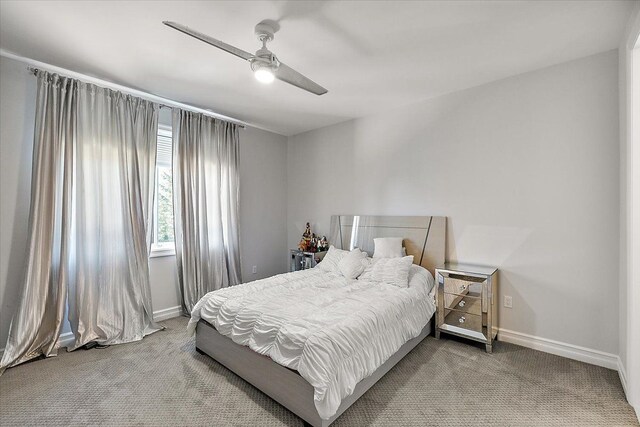 3888 Thatcher Dr, Rochester Hills, MI 48309 - bedroom with carpet floors, baseboards, and ceiling fan