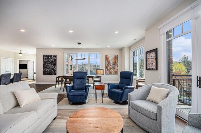 441 S Ashley Unit 306, Ann Arbor, MI 48103 - living area featuring baseboards, wood finished floors, and recessed lighting