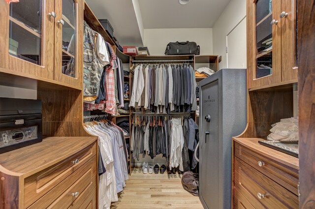 spacious closet with light wood-style floors