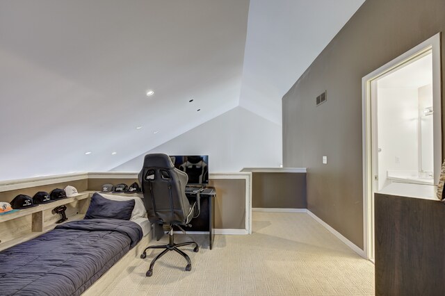 office with vaulted ceiling, baseboards, carpet flooring, and visible vents