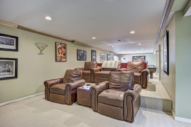 cinema featuring crown molding, baseboards, light carpet, and recessed lighting