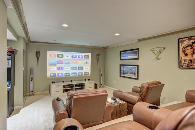home theater featuring baseboards, ornamental molding, recessed lighting, and carpet floors