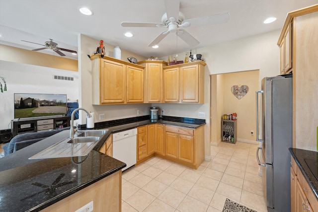 11613 Butler Rd, Willis, MI 48191 - kitchen with a sink, visible vents, freestanding refrigerator, ceiling fan, and dishwasher