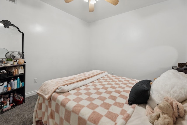 11613 Butler Rd, Willis, MI 48191 - carpeted bedroom with a ceiling fan and baseboards