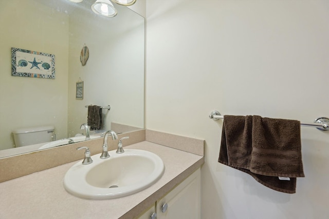 11613 Butler Rd, Willis, MI 48191 - bathroom featuring toilet and vanity