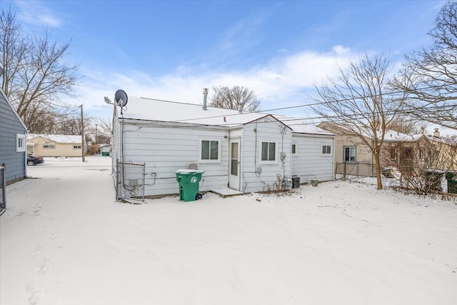 view of snow covered house